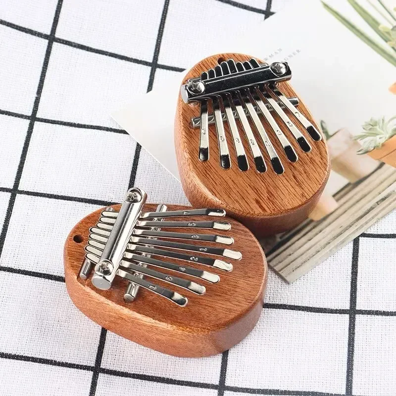 เปียโนนิ้วหัวแม่มือไม้ขนาดเล็ก - Musical Instrument Piano บทวิจารณ์และราคา