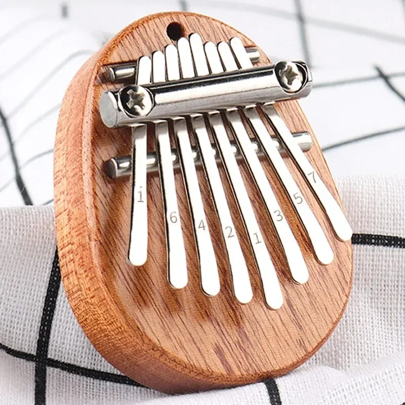เปียโนนิ้วหัวแม่มือไม้ขนาดเล็ก - Musical Instrument Piano บทวิจารณ์และราคา