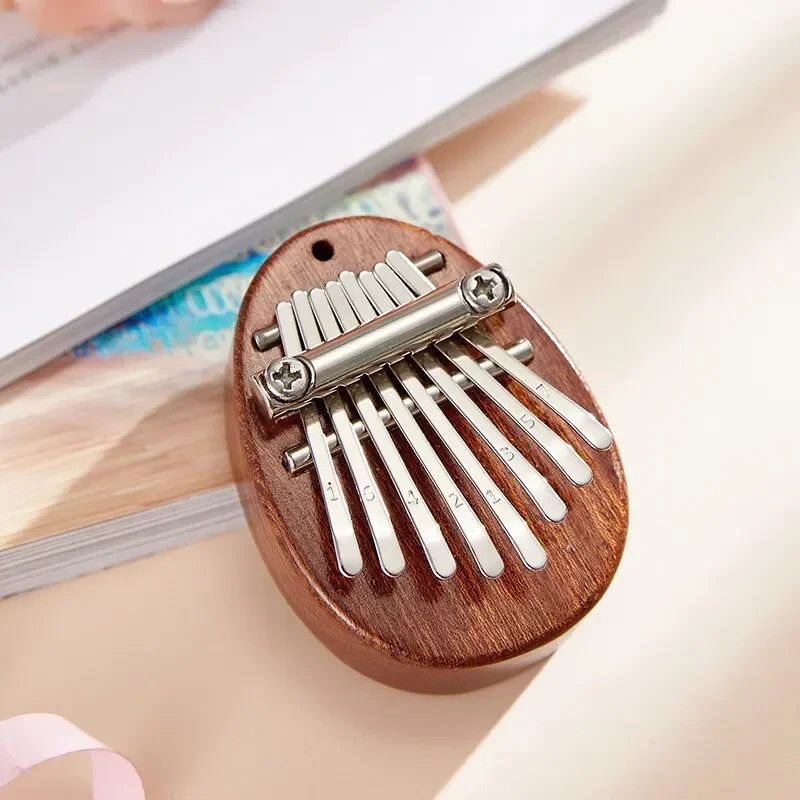 เปียโนนิ้วหัวแม่มือไม้ขนาดเล็ก - Musical Instrument Piano บทวิจารณ์และราคา